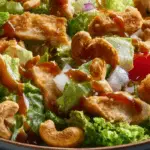 Chicken Cashew Crunch Salad with crispy chicken, toasted cashews, and lettuce