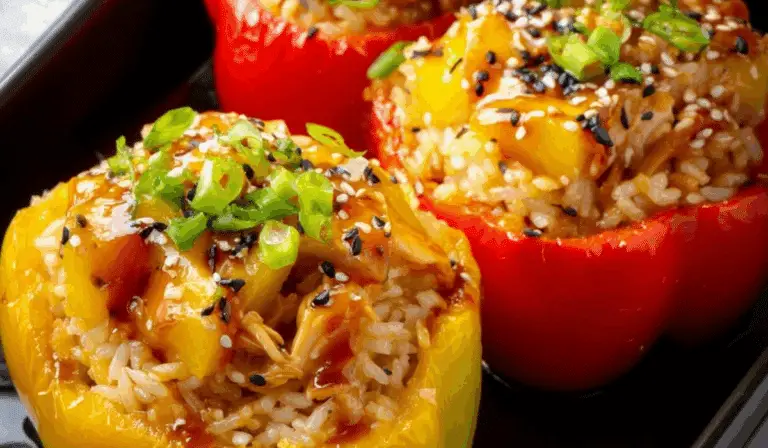 Teriyaki Pineapple Chicken Rice Stuffed Peppers with sesame and scallions