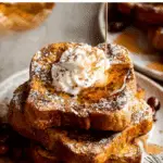 Gingerbread french toast with whipped cream and syrup
