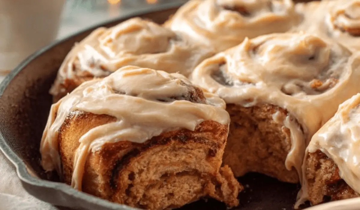 Gingerbread Cinnamon Rolls fresh baked in holiday setting