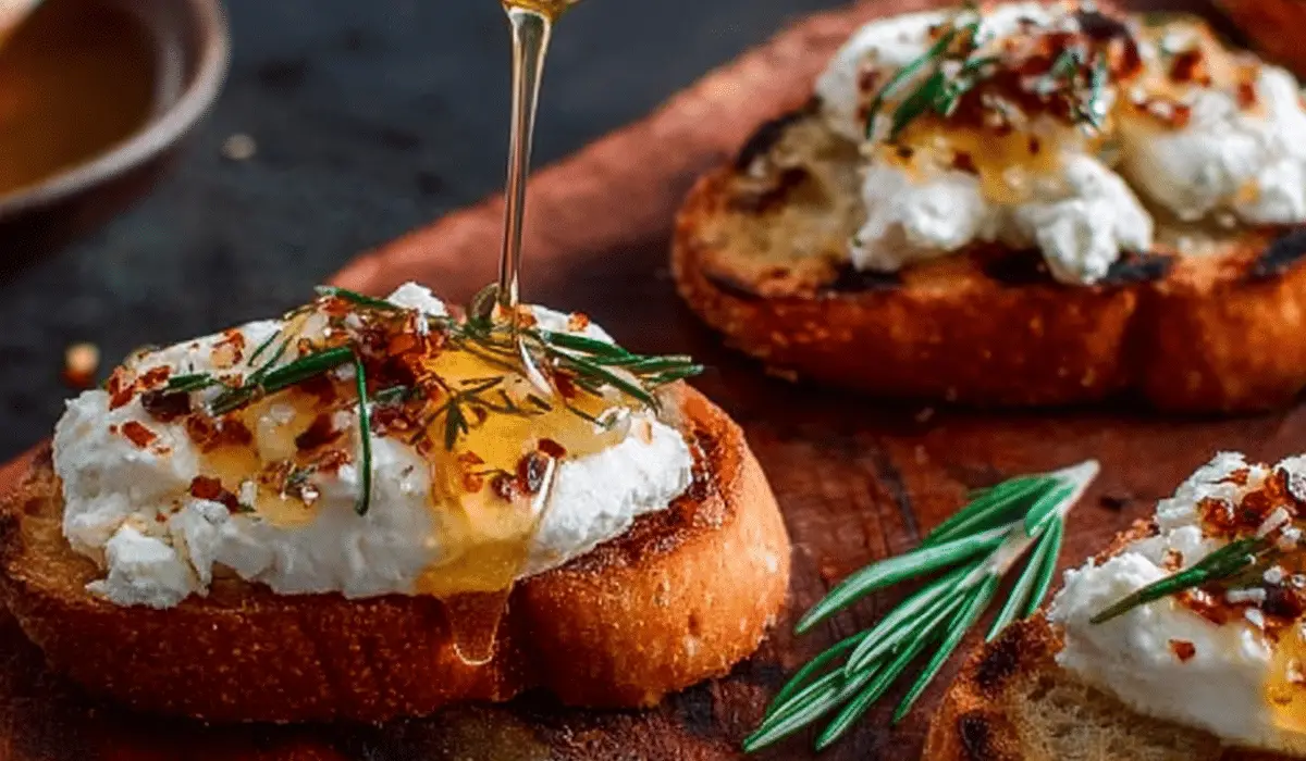 Spicy Honey Drizzled Feta Crostini on board