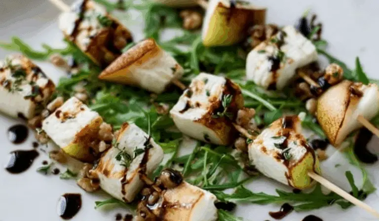 Pear and Brie Cheese Salad Skewers on rustic board