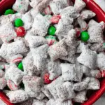 Christmas Puppy Chow holiday bowl with festive candies