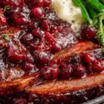 Cranberry Roast Beef on rustic platter