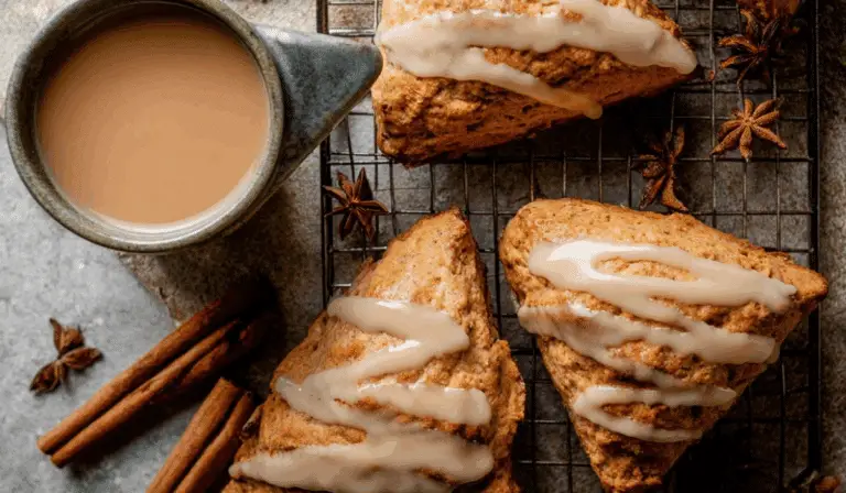 Maple Chai Glazed Scones on a rustic table
